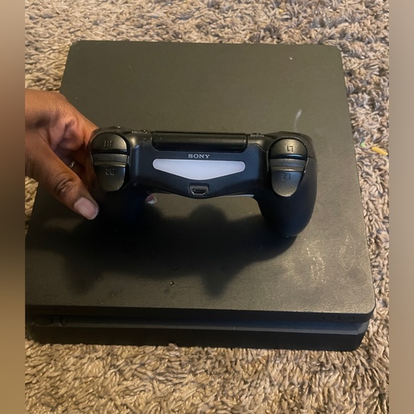 PlayStation 4 with controller